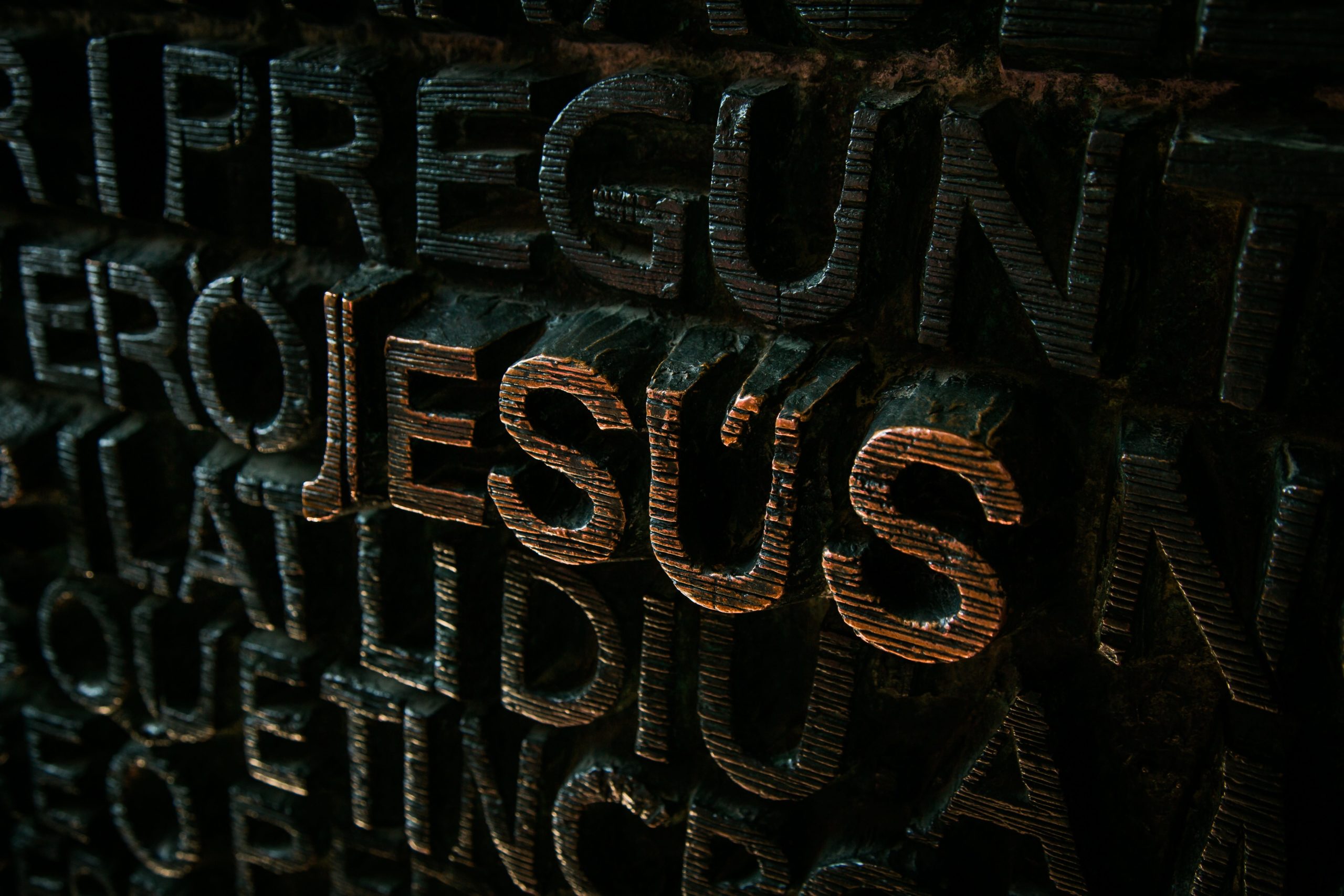 Jesus written on rock